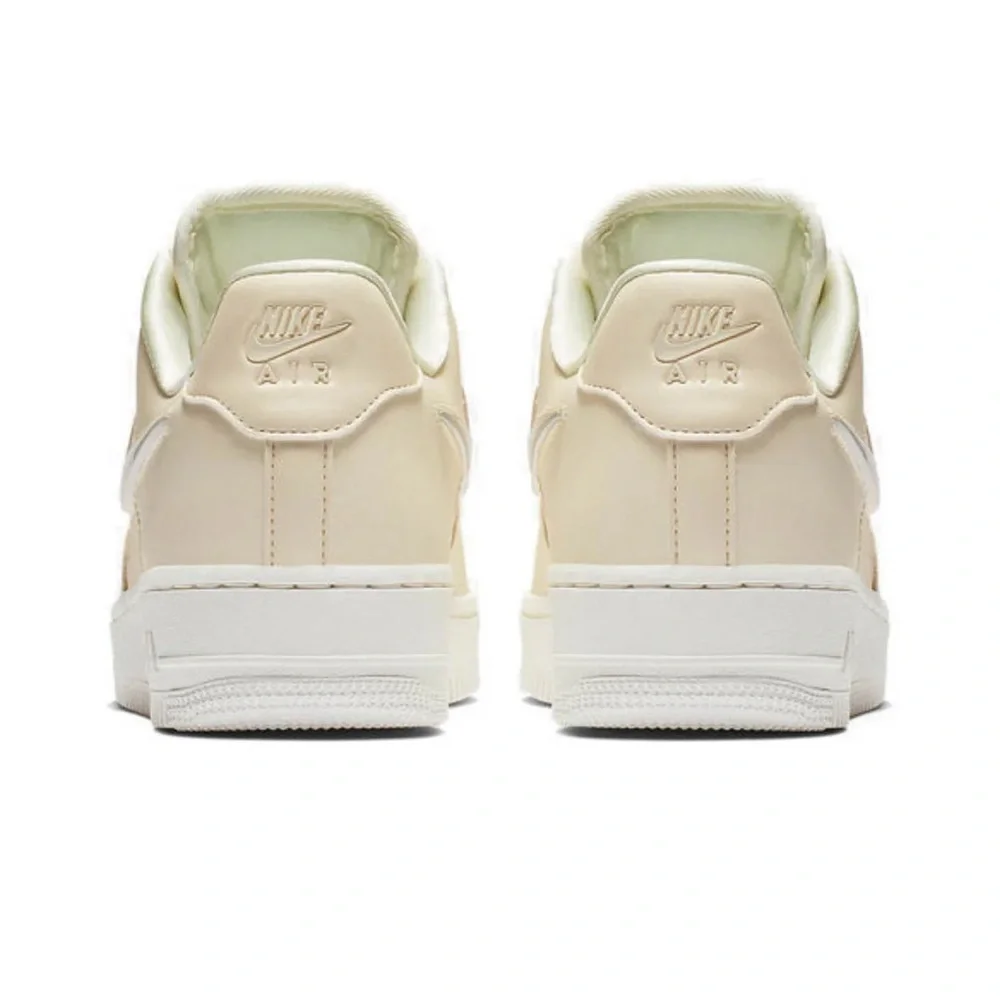 Nike | Women’s Pale Ivory Jelly Jewel Air Force 1 lace up sneaker, size 8.5